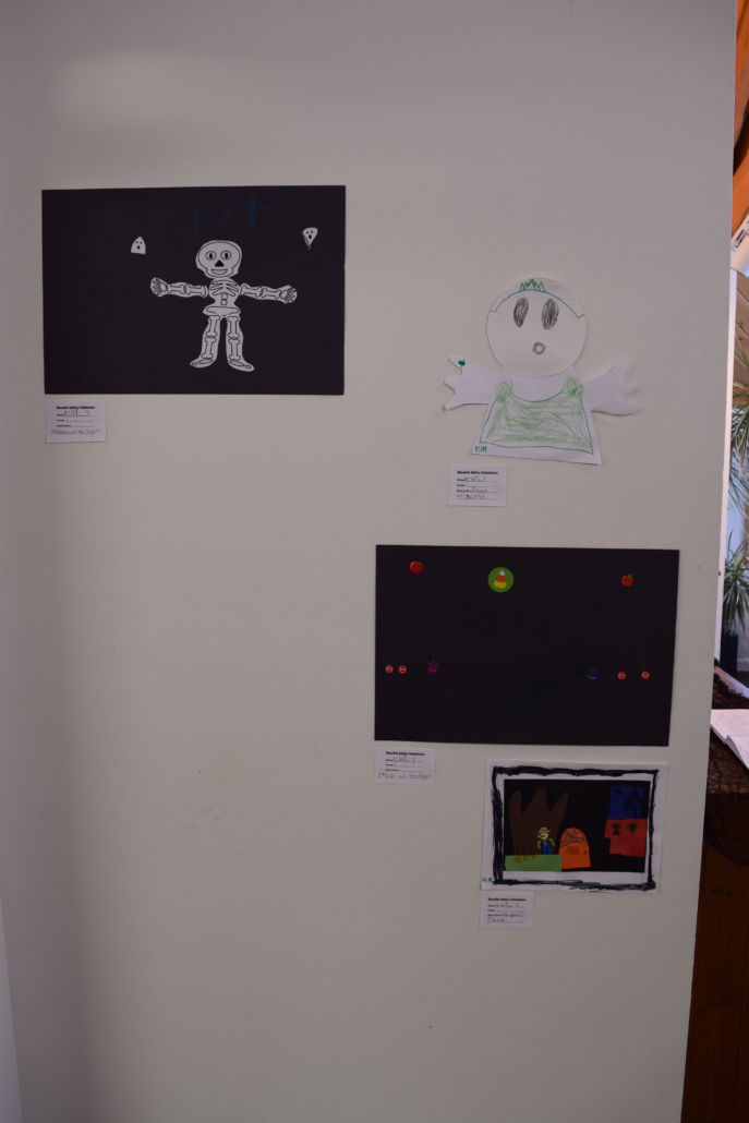 Horror art hanging on a gallery wall