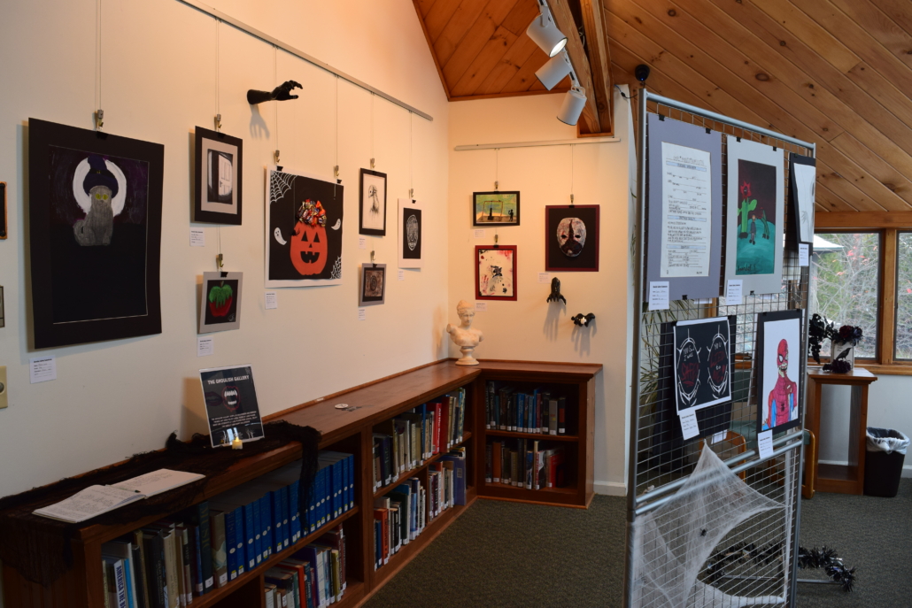 An art gallery full of Halloween and horror art